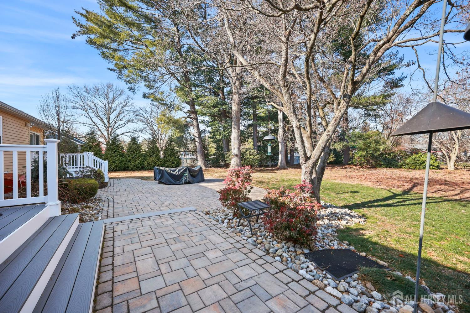 568 Village Road West Windsor, NJ 08550 - Photo 32 of 43 a street view with large trees