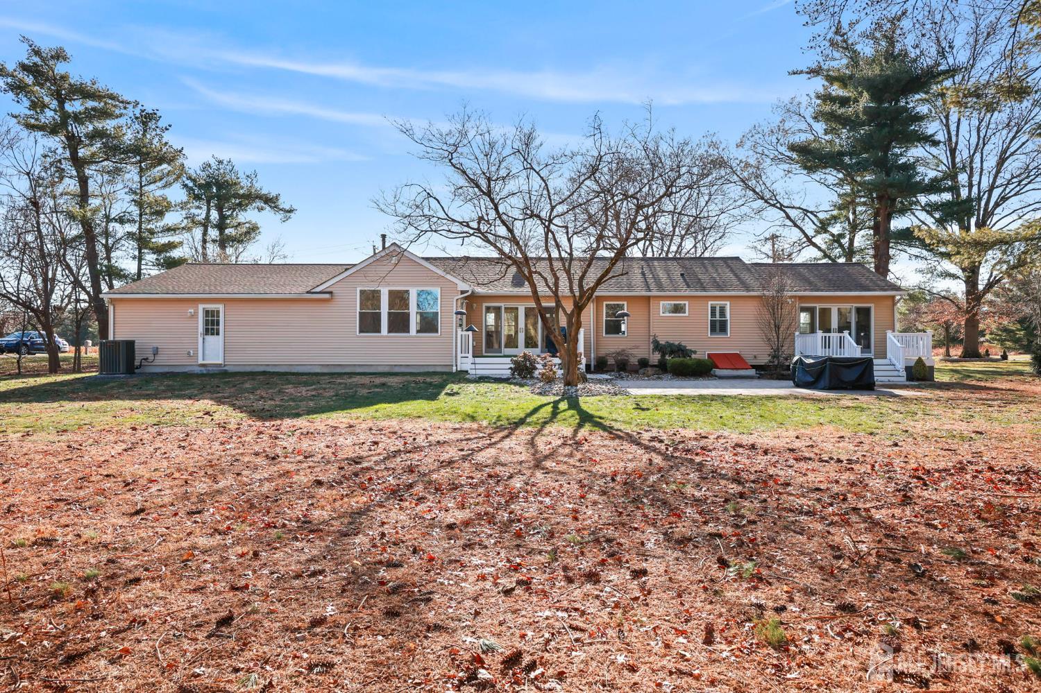 568 Village Road West Windsor, NJ 08550 - Photo 38 of 43 a view of house with outdoor space and swimming pool