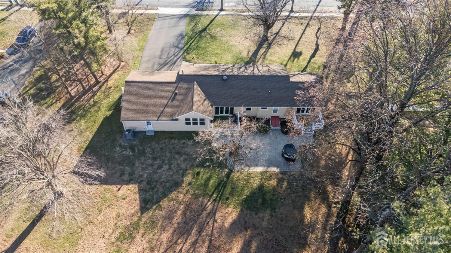 568 Village Road West Windsor, NJ 08550 - Photo 41 of 43 a view of a house with a yard