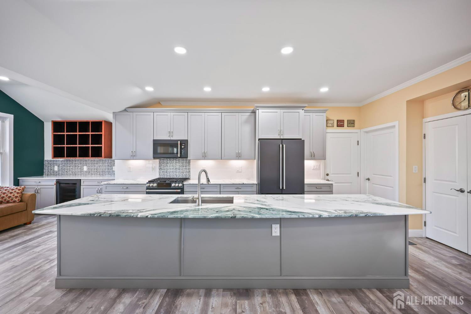 568 Village Road West Windsor, NJ 08550 - Photo 6 of 43 a view of kitchen with wooden floor