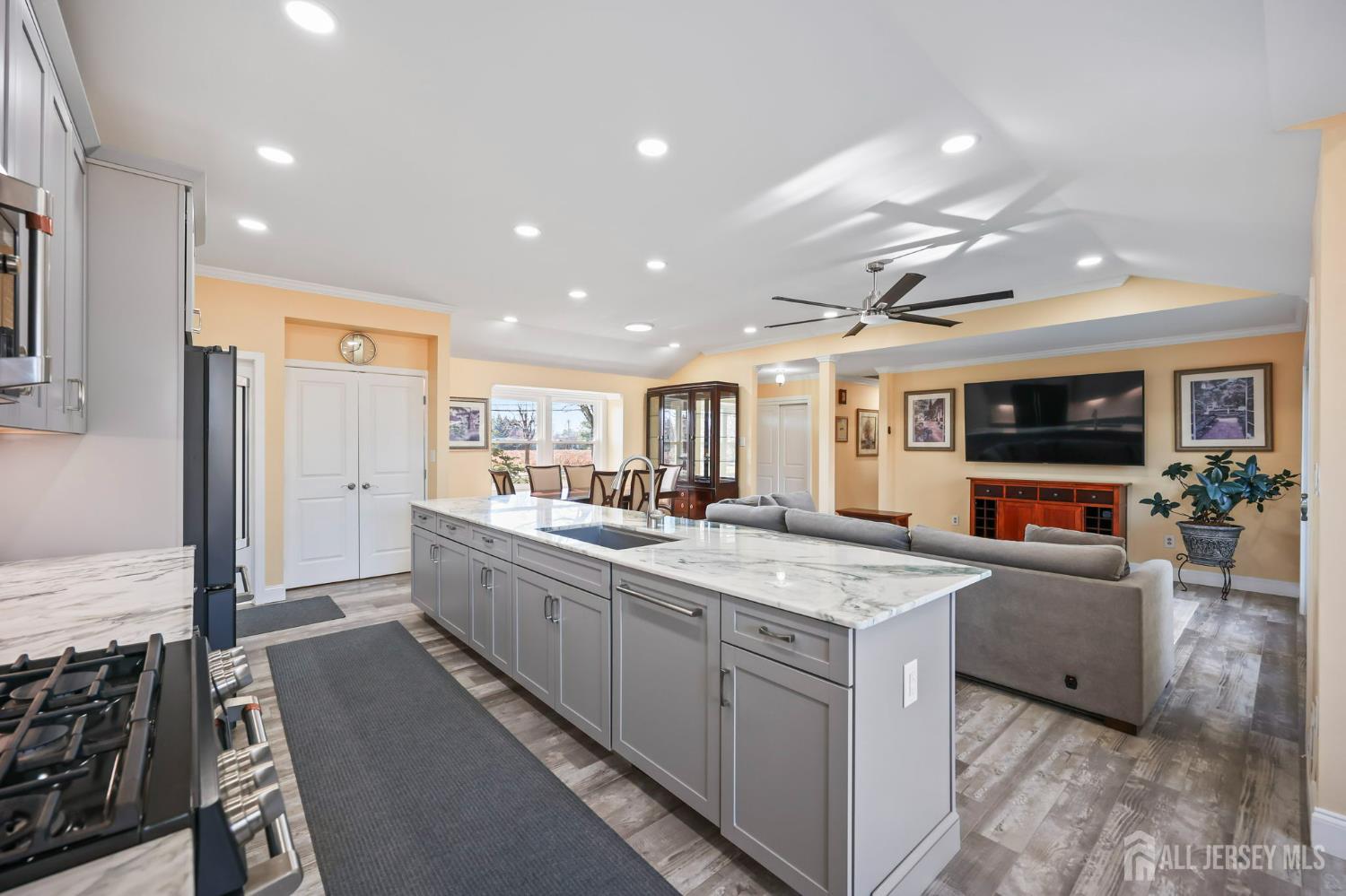 568 Village Road West Windsor, NJ 08550 - Photo 8 of 43 a large white kitchen with a large window