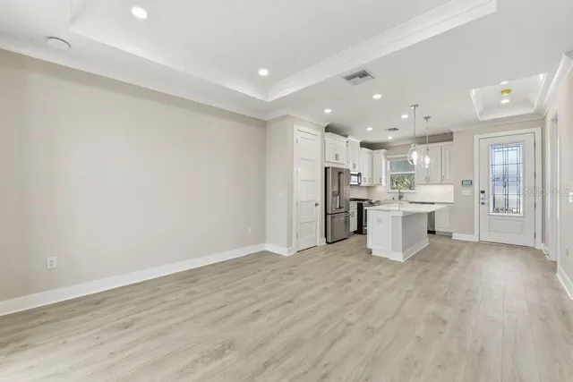 a view of kitchen with wooden floor