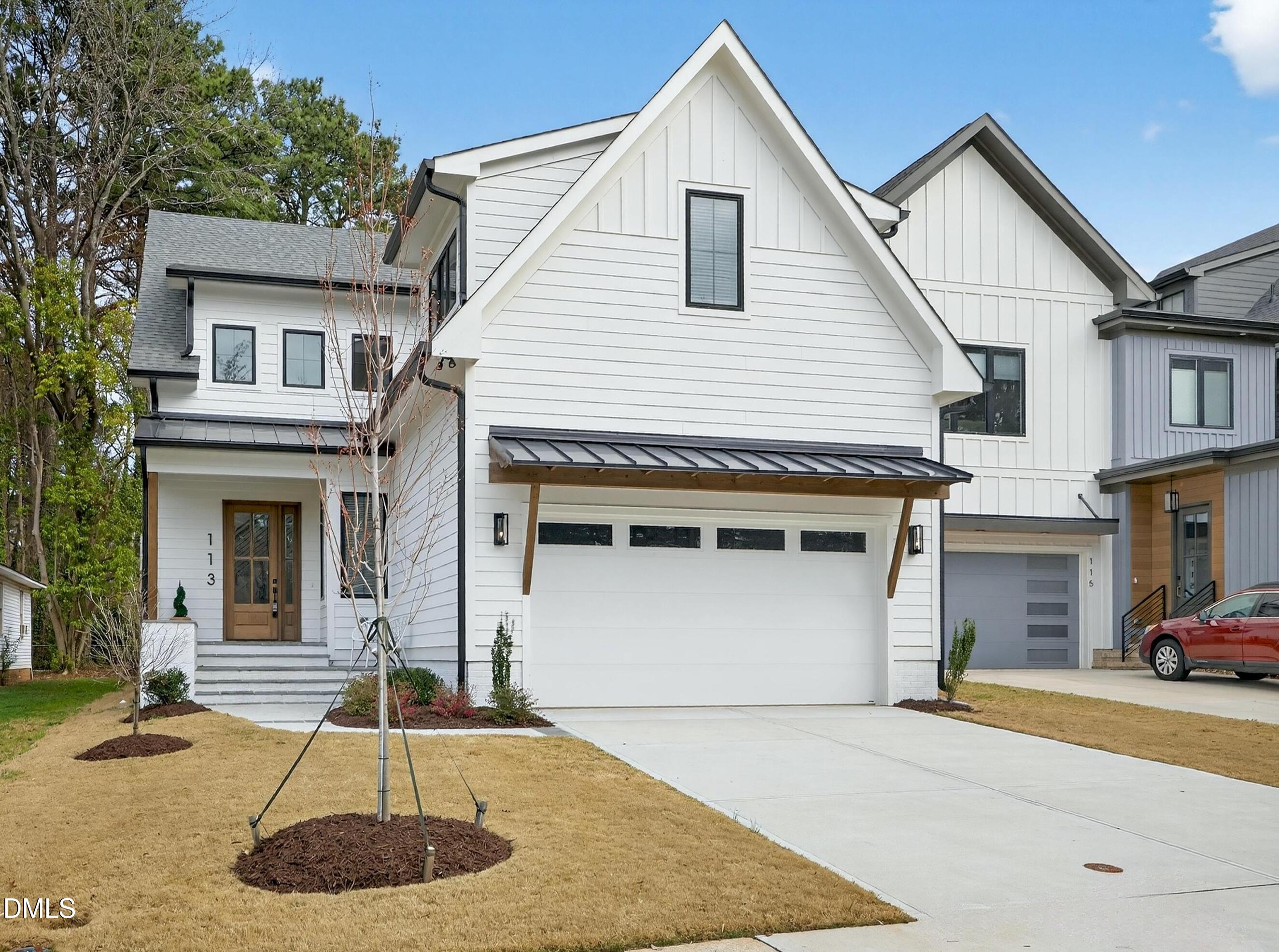113 Boyd Street Cary, NC 27513 - Photo 1 of 88 a front view of a house with a garage