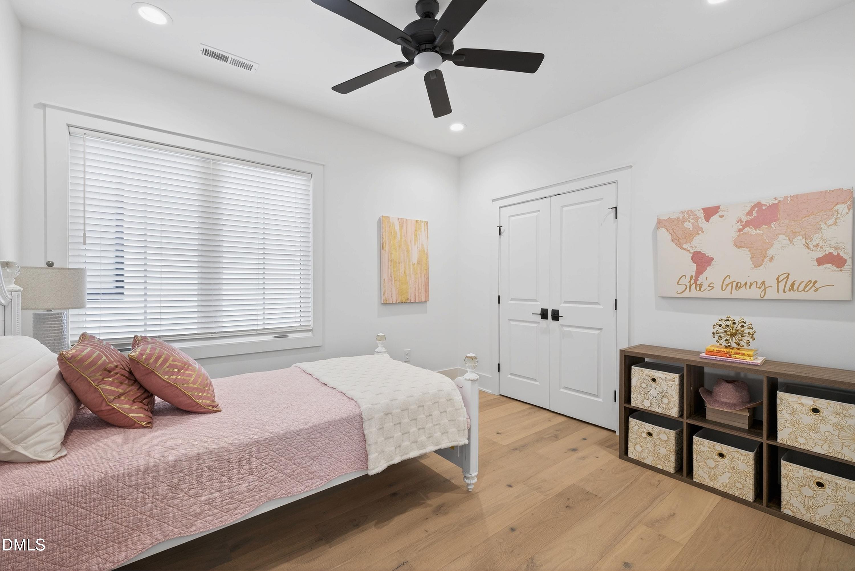 113 Boyd Street Cary, NC 27513 - Photo 57 of 88 a bedroom with a bed and a table