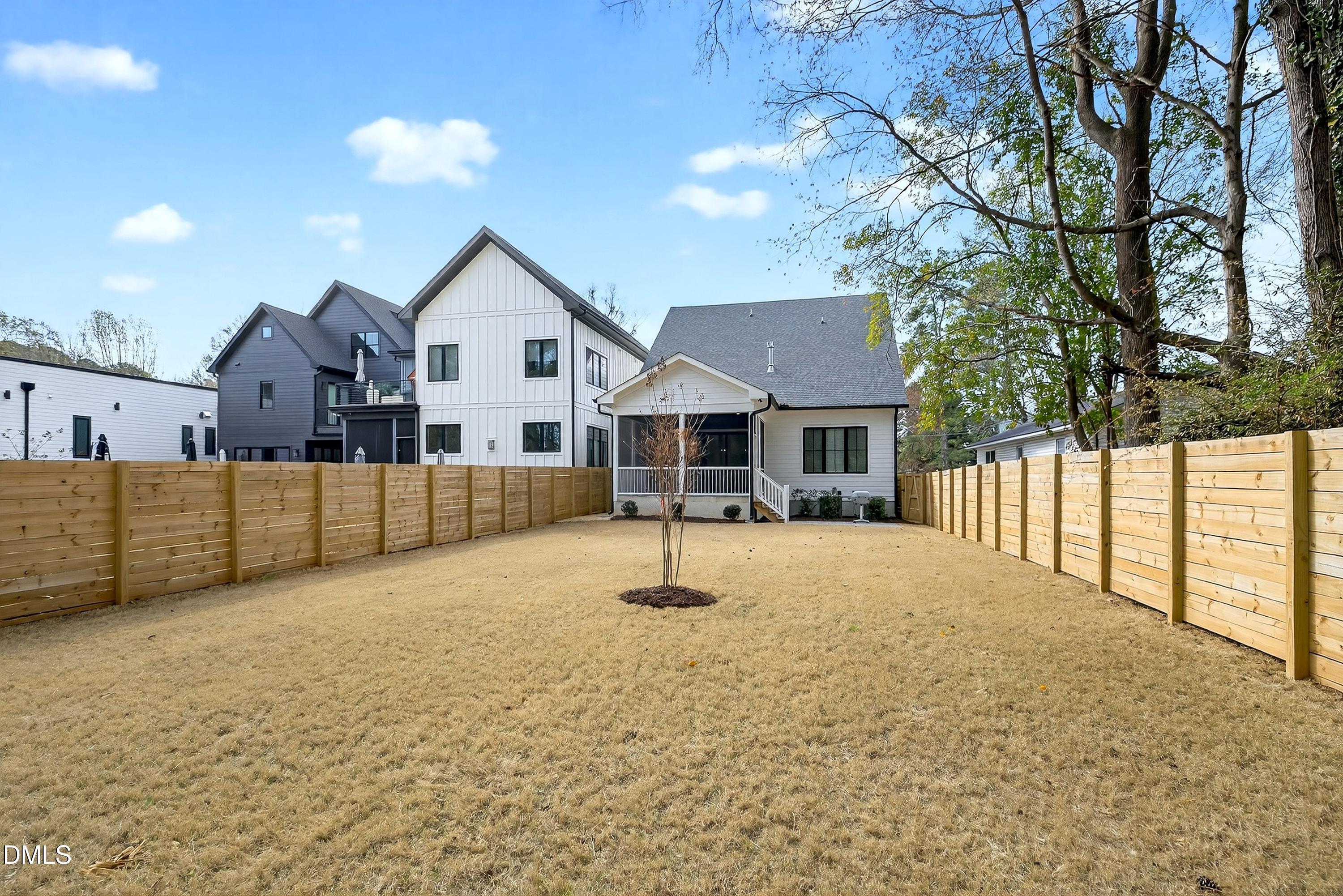 113 Boyd Street Cary, NC 27513 - Photo 68 of 88 a house view with a garden space