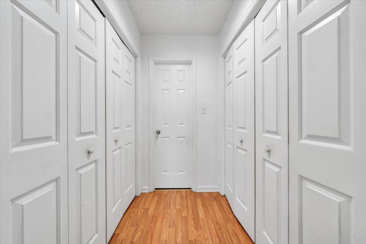 3870 Goose Dam Road Rocky Mount, VA 24151 - Photo 22 of 44 a view of a hallway with wooden floor