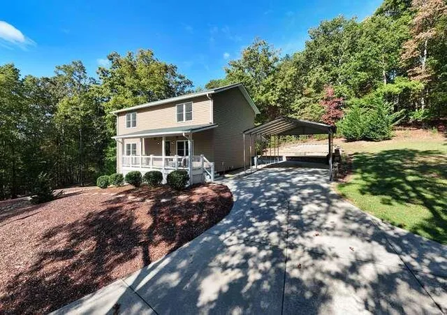 a kitchen with kitchen island a counter space and stainless steel appliances