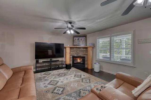 a large kitchen with kitchen island a sink stainless steel appliances and a counter top