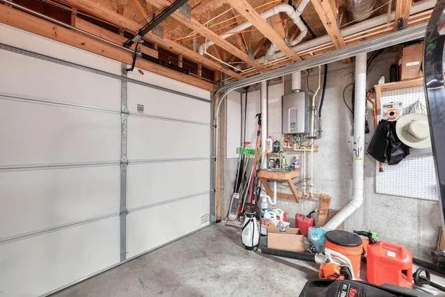a view of a house with a yard and tree s