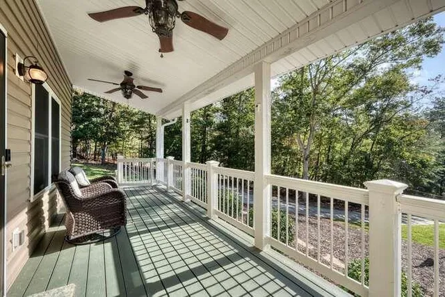 an aerial view of houses covered in trees