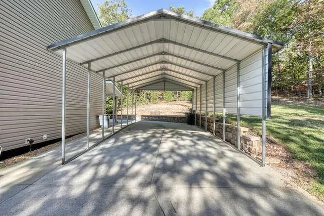 a view of a field with an ocean view
