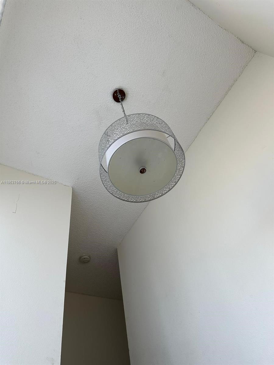 11208 Southwest 67th Terrace Miami, FL 33173 - Photo 11 of 33 a bathroom with a sink and a mirror