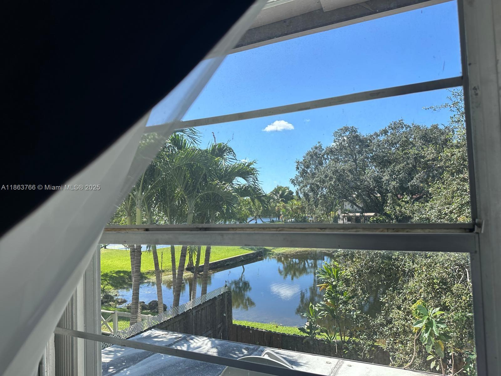 11208 Southwest 67th Terrace Miami, FL 33173 - Photo 27 of 33 a view of swimming pool from a balcony