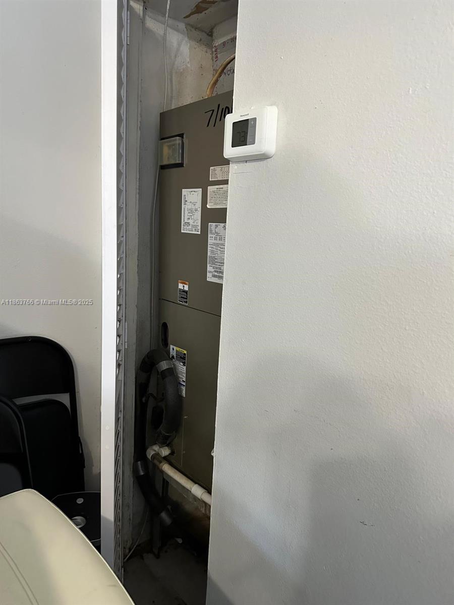 11208 Southwest 67th Terrace Miami, FL 33173 - Photo 10 of 33 a bathroom with a sink and a toilet