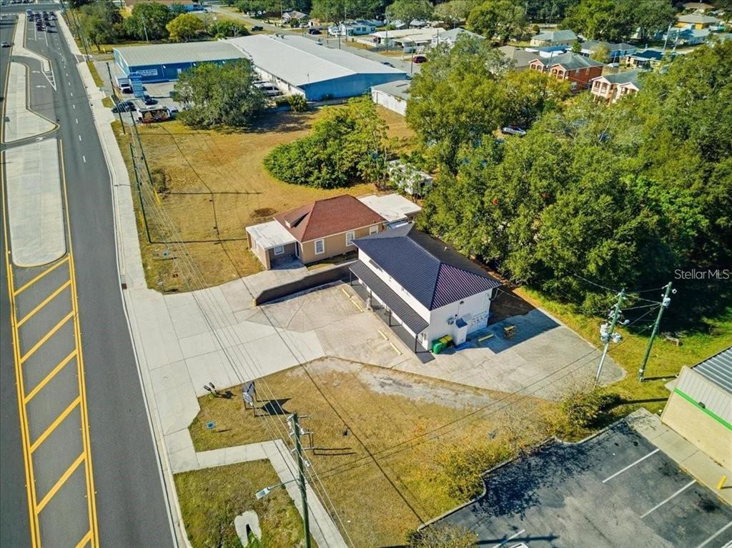 610 Dundee Road, Unit 1 Dundee, FL 33838 - Photo 27 of 28 an aerial view of a house with swimming pool