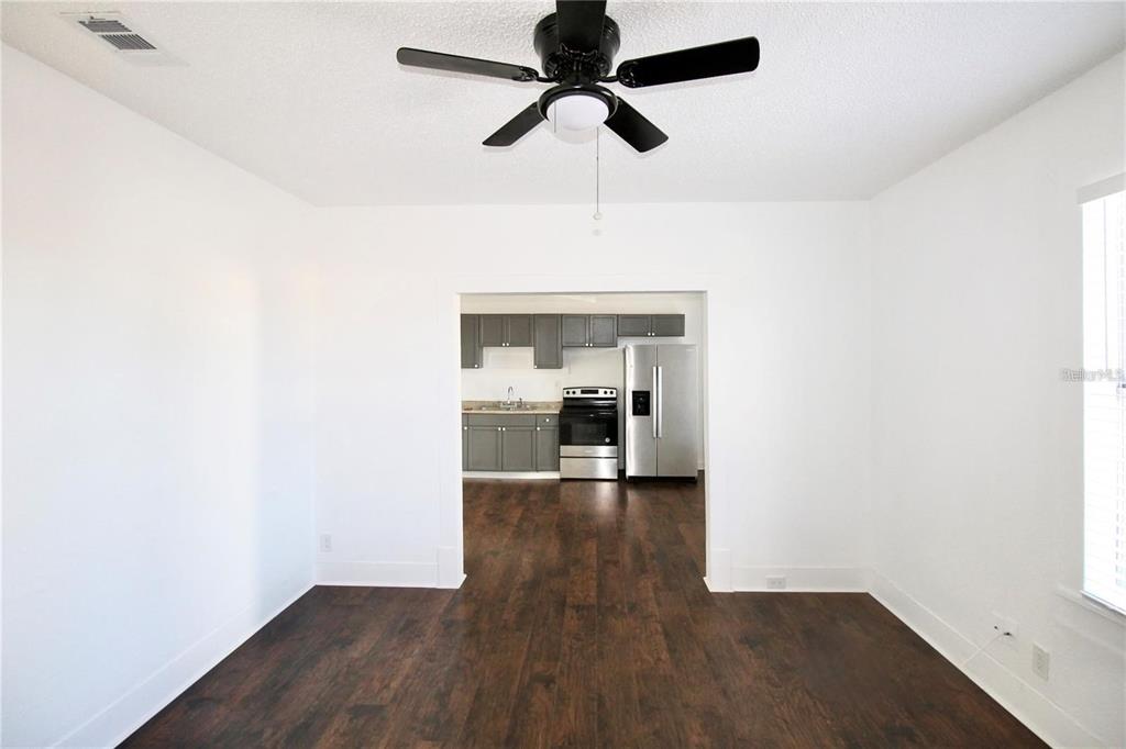 610 Dundee Road, Unit 1 Dundee, FL 33838 - Photo 7 of 28 a view of hallway with wooden floor