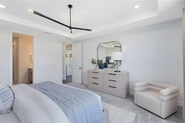 a bathroom with a sink double vanity granite and a mirror