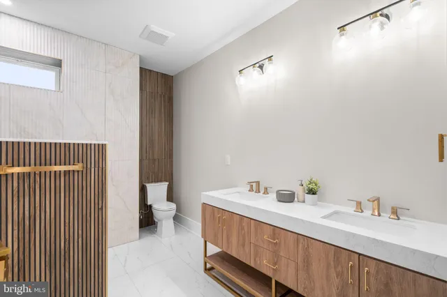 a bathroom with a sink and a toilet