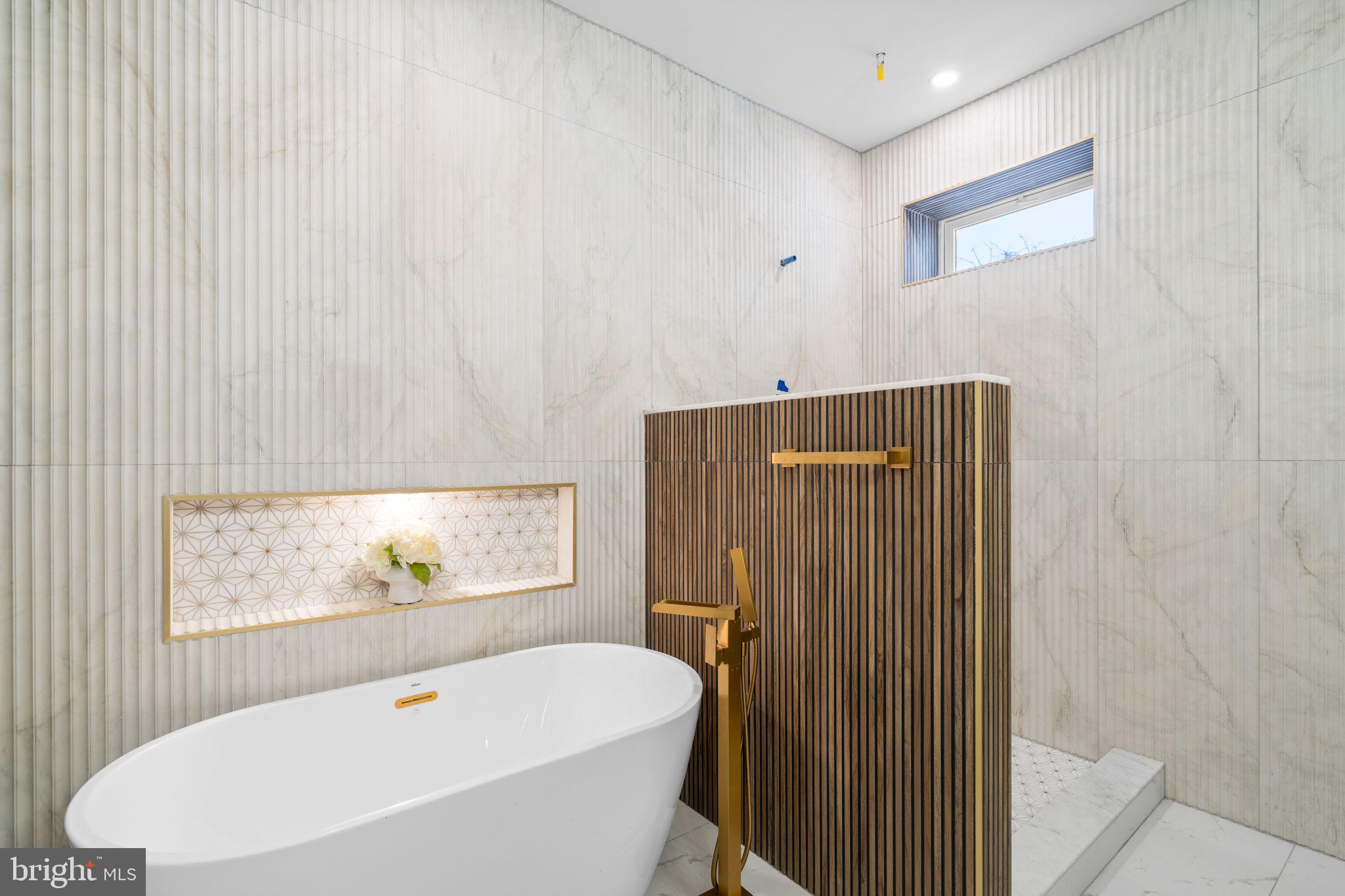 1816 13th Street Northwest Washington, DC 20009 - Photo 22 of 30 a bathroom with a bathtub and a shower