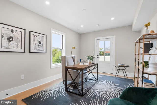 a workspace with furniture and window