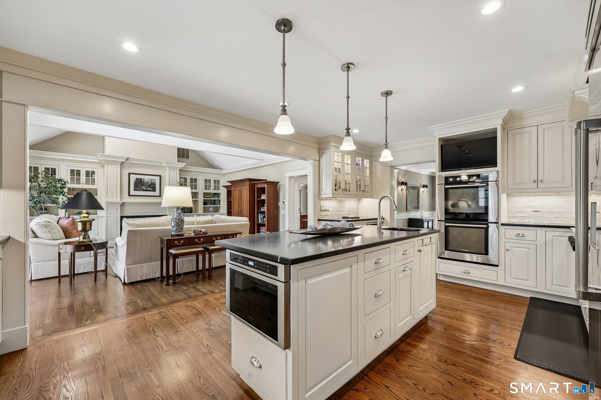 72 Strawberry Hill Road Madison, CT 06443 - Photo 12 of 40 Features of the kitchen include an undermount microwave drawer, double ovens, Bosch dishwasher, Viking six burner propane cooktop, Thermador refrigerator and a wine cooler