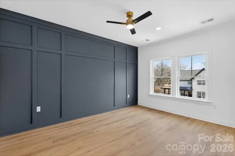 a bathroom with a toilet and a bathtub