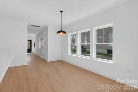 a view of a hallway with closet