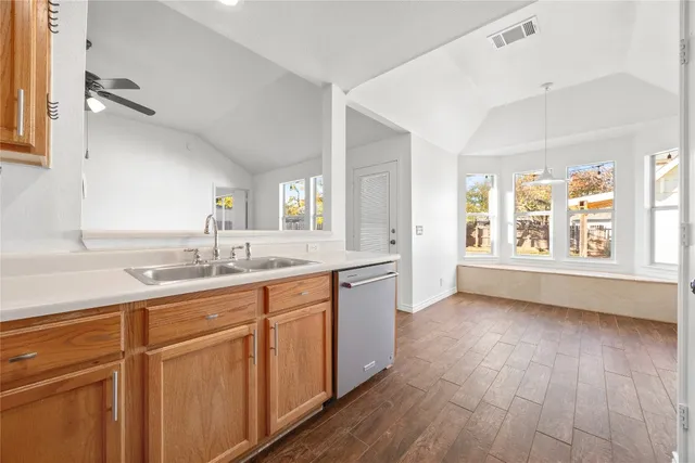 a bathroom with a sink mirror double vanity and a bathtub