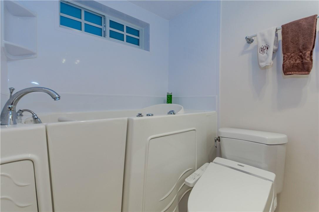 1040 Southwest 21st Street Boca Raton, FL 33486 - Photo 27 of 38 Whirlpool and Shower in Walk In Bathtub