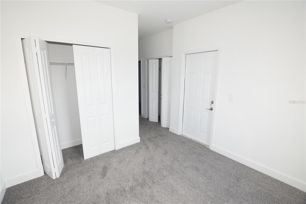 460 Lake Shore Parkway Davenport, FL 33896 - Photo 20 of 27 a view of an empty room