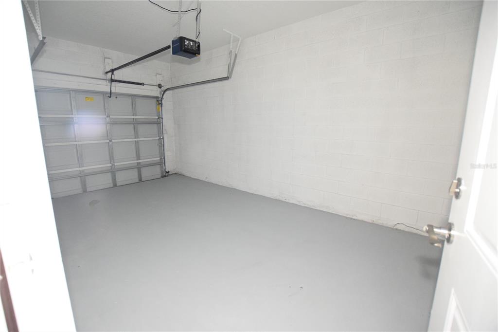 460 Lake Shore Parkway Davenport, FL 33896 - Photo 10 of 27 a view of a garage