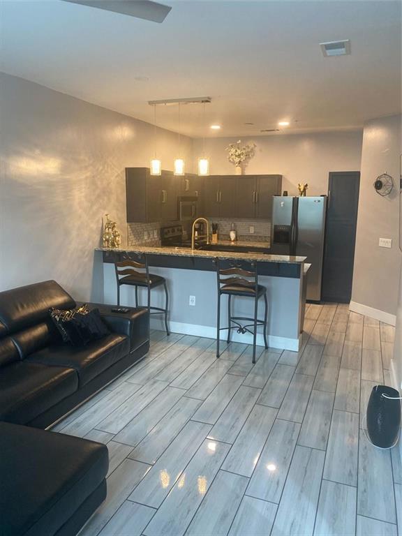 a living room with a couch and a coffee table