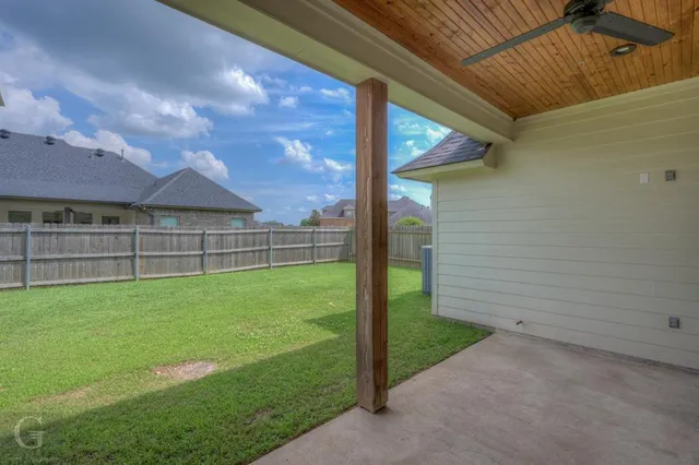 a view of a backyard with a garden