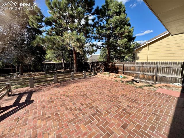 280 Raven Hills Road Colorado Springs, CO 80919 - Photo 14 of 48 View of patio / terrace featuring a fenced backyard