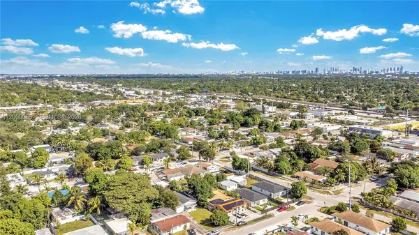 a view of city and green space