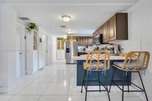 a view of a dining room with furniture