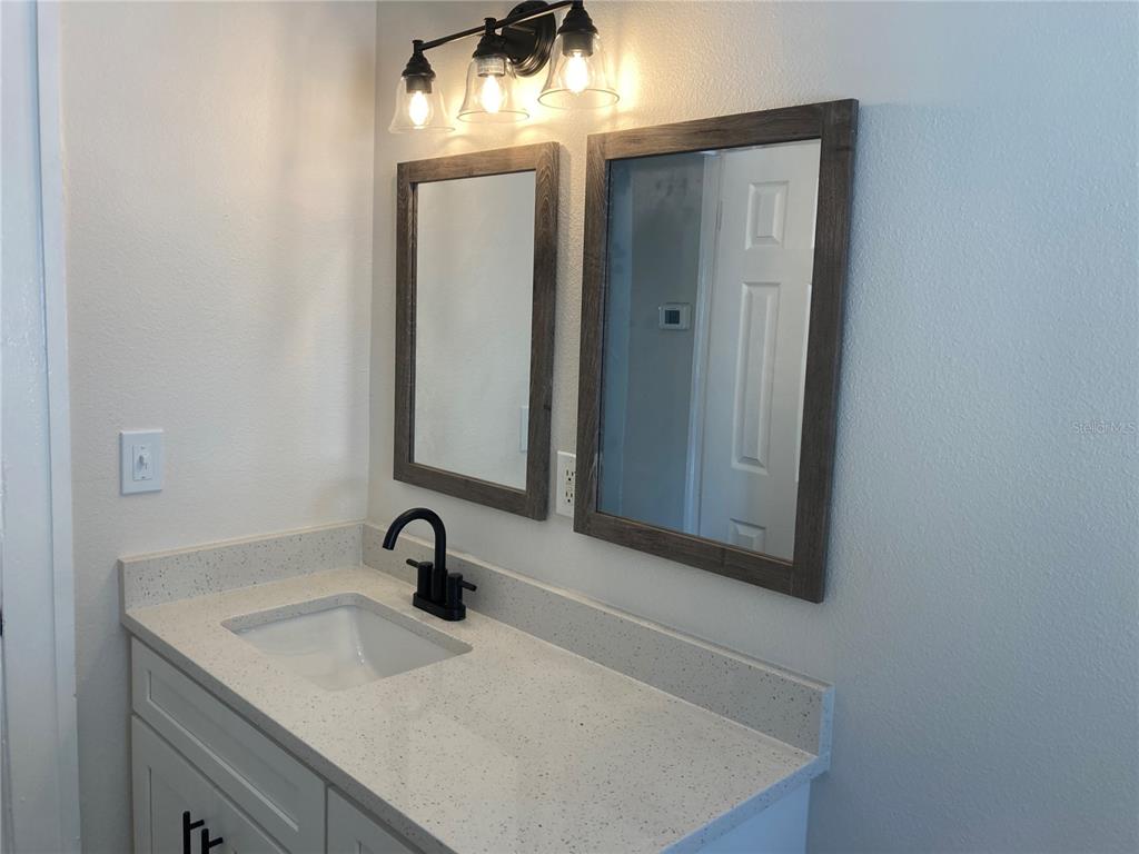 5200 3rd Avenue South St. Petersburg, FL 33707 - Photo 15 of 47 a close view of a sink and a vanity