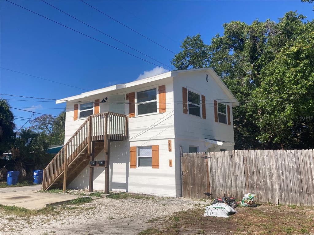 5200 3rd Avenue South St. Petersburg, FL 33707 - Photo 16 of 47 a front view of a house with a yard