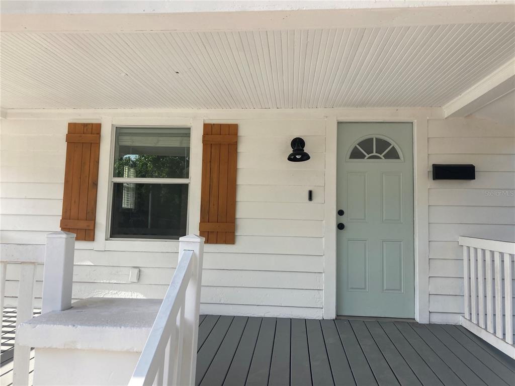 5200 3rd Avenue South St. Petersburg, FL 33707 - Photo 2 of 47 a view of front door and deck of the house