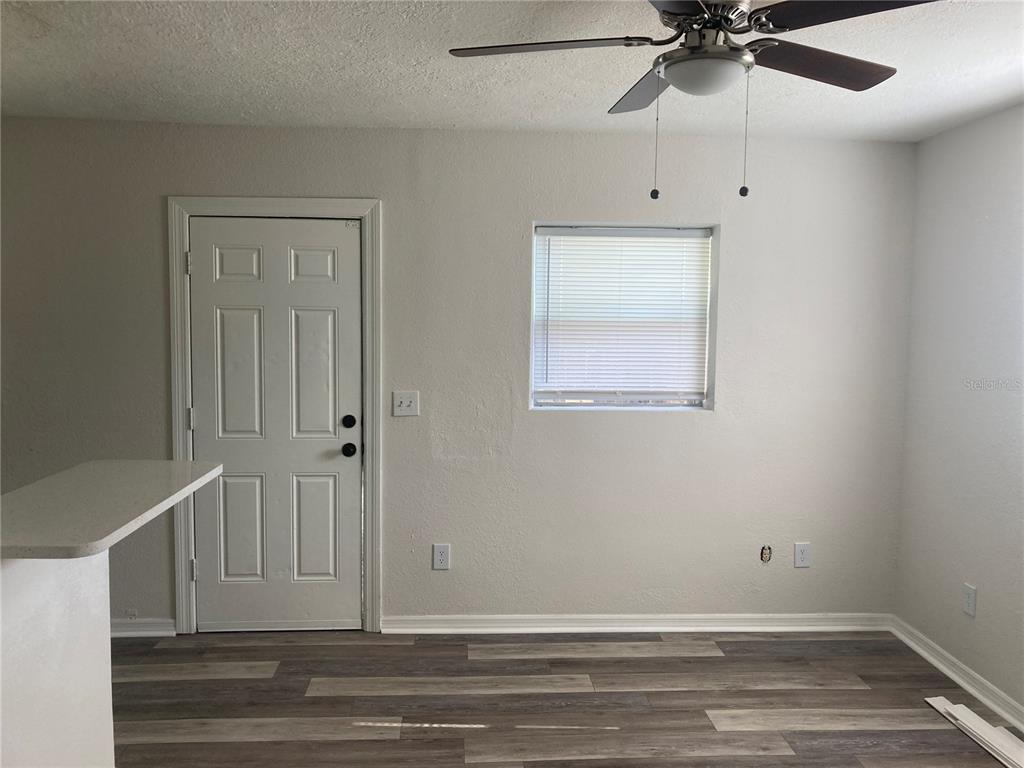 5200 3rd Avenue South St. Petersburg, FL 33707 - Photo 25 of 47 an empty room with fan and windows