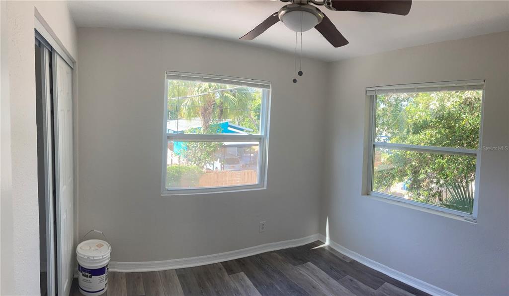 5200 3rd Avenue South St. Petersburg, FL 33707 - Photo 28 of 47 a view of room with window and hardwood floor