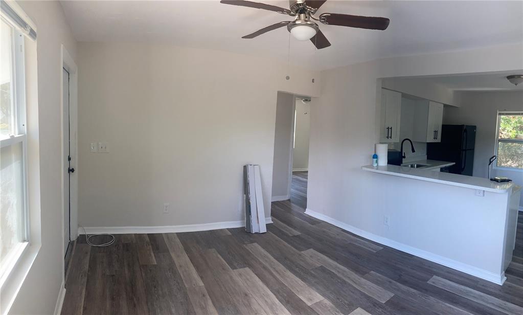 5200 3rd Avenue South St. Petersburg, FL 33707 - Photo 36 of 47 a view of empty room with wooden floor and fan