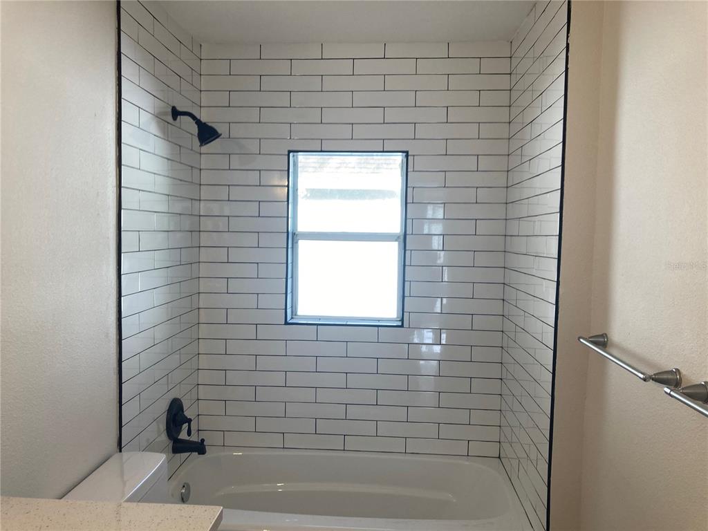 5200 3rd Avenue South St. Petersburg, FL 33707 - Photo 46 of 47 a bathroom with a bathtub