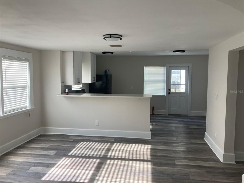 5200 3rd Avenue South St. Petersburg, FL 33707 - Photo 9 of 47 a view of a kitchen from the hallway