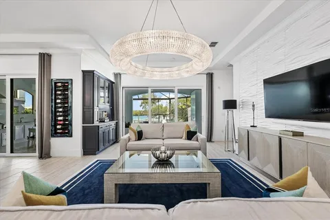 a large kitchen with a table and chairs
