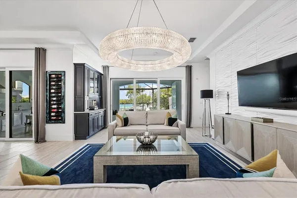 a large kitchen with a table and chairs