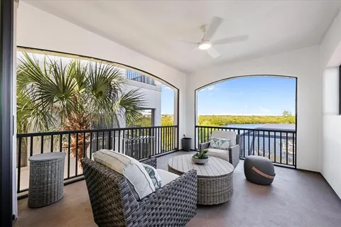 a view of a livingroom with furniture window and outside view