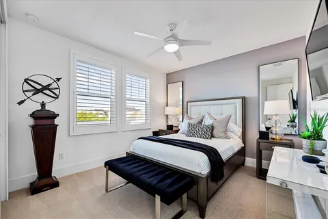 an aerial view of a house with a lake view