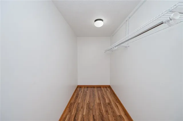 a bathroom with a sink a vanity and a mirror
