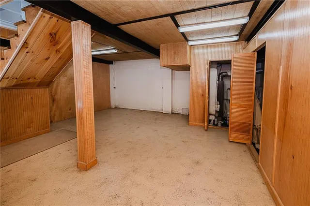 a view of front door with wooden floor